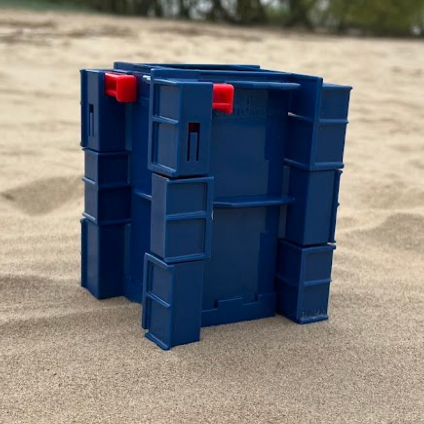 Sandmasons blue sandcastle kit wall and tower forms for detailed castle construction in sand or snow.