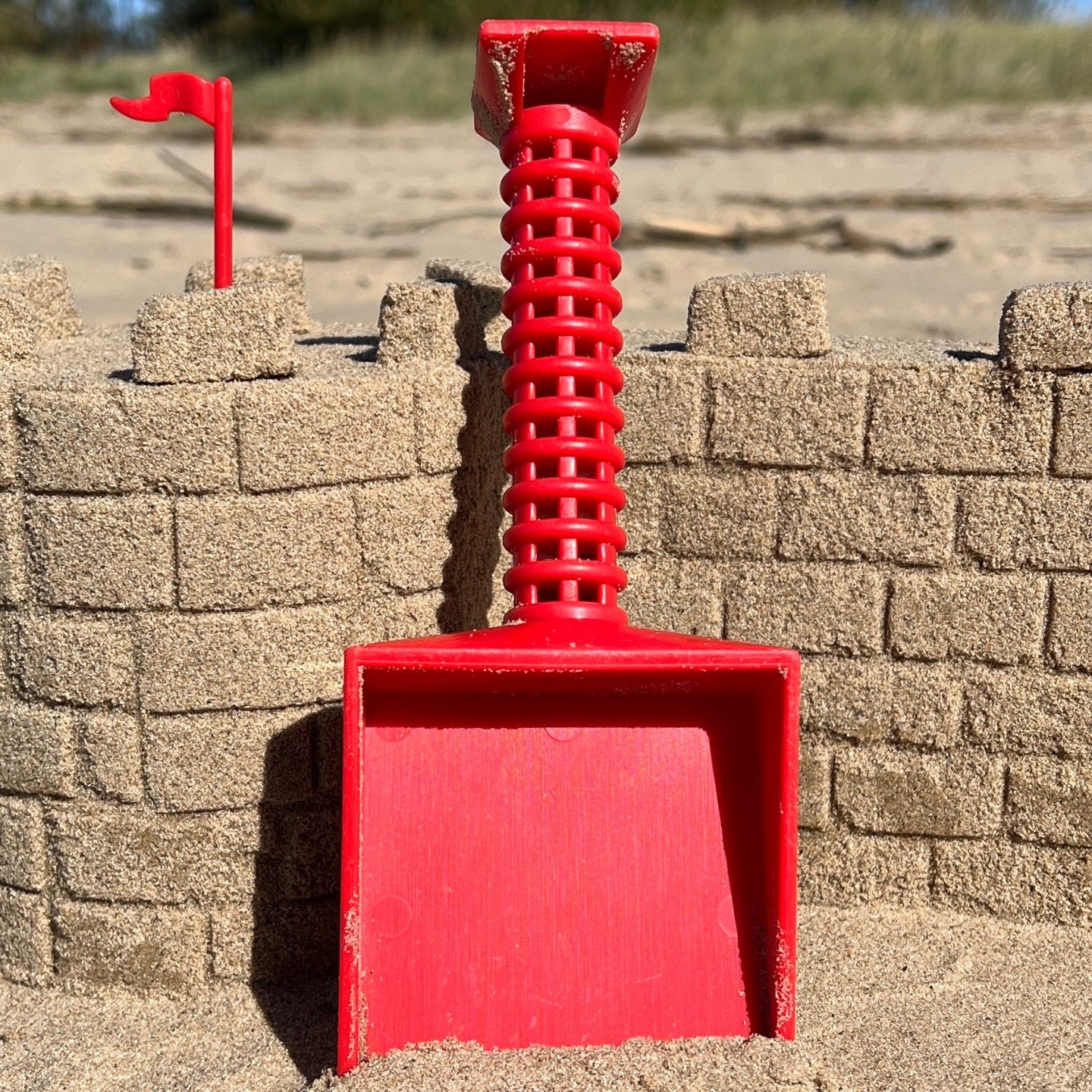 Sandmasons sandcastle kit shovel. Durable shovel engineered for filling and packing sand or snow into forms.