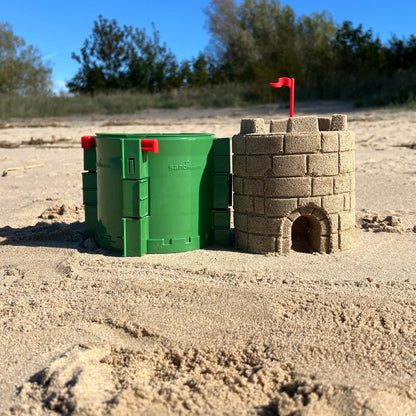 Sandmasons Sandcastle Kit green tower forms for building round sand and snow castle towers.